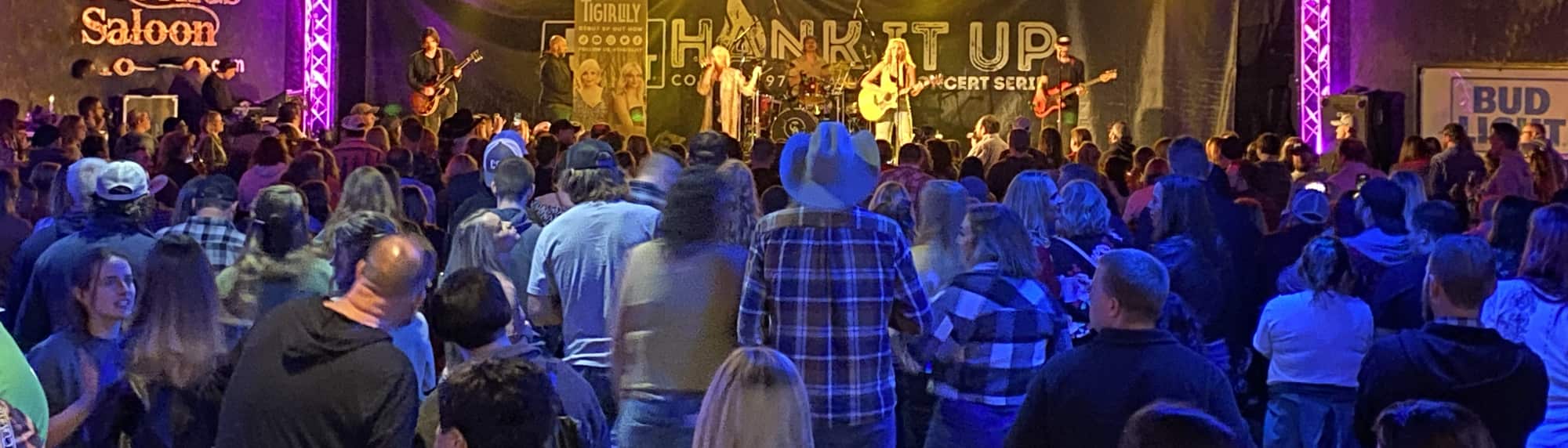 country concert with fans wearing cowboy hats Indianapolis