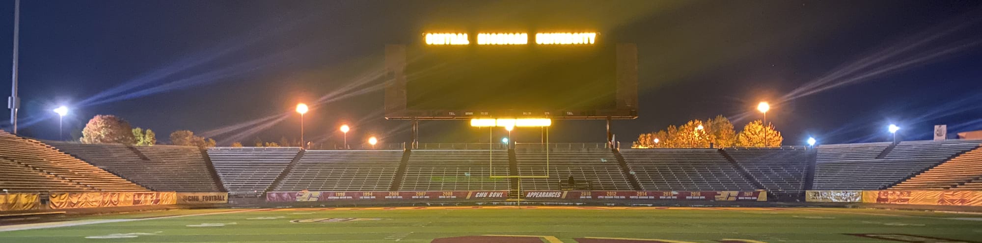 empty football stadium at night under the lights Indianapolis