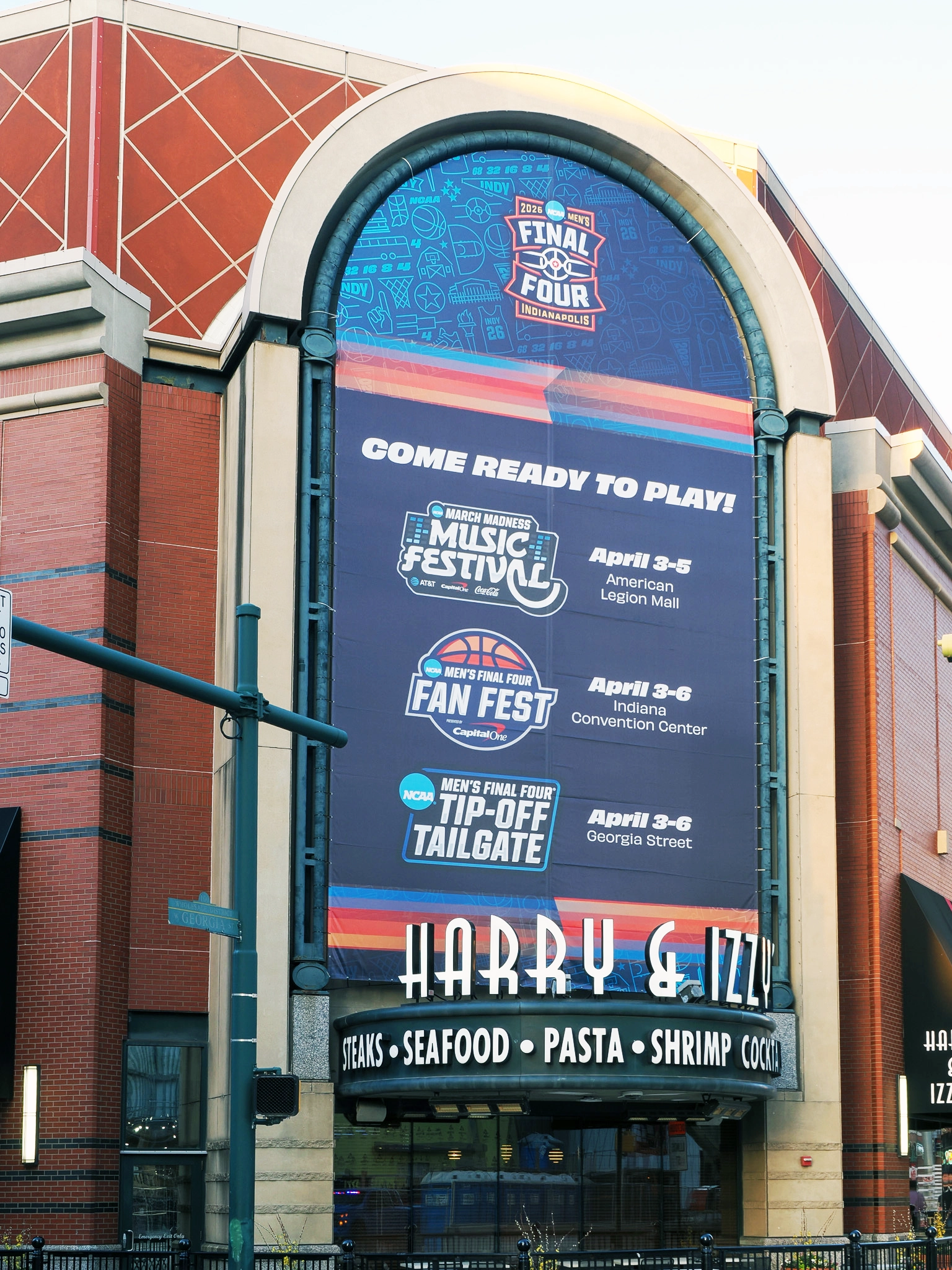 Harry and Izzy's restaurant with the final four banner and key dates